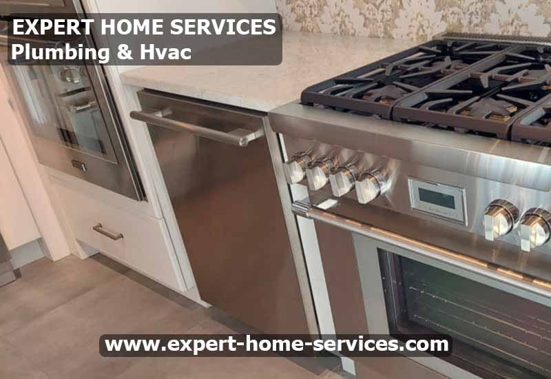 Appliance Installation by Expert Home - Modern kitchen with built-in dishwasher and refrigerator