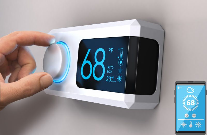 New Wi-Fi thermostat mounted on a wall - Smart Home Thermostat Service